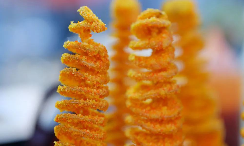 Spiral tornado potatoes, golden fried and seasoned on skewers at SANKU MAOTS'AI-LA, a Chinese Restaurant in City of Industry